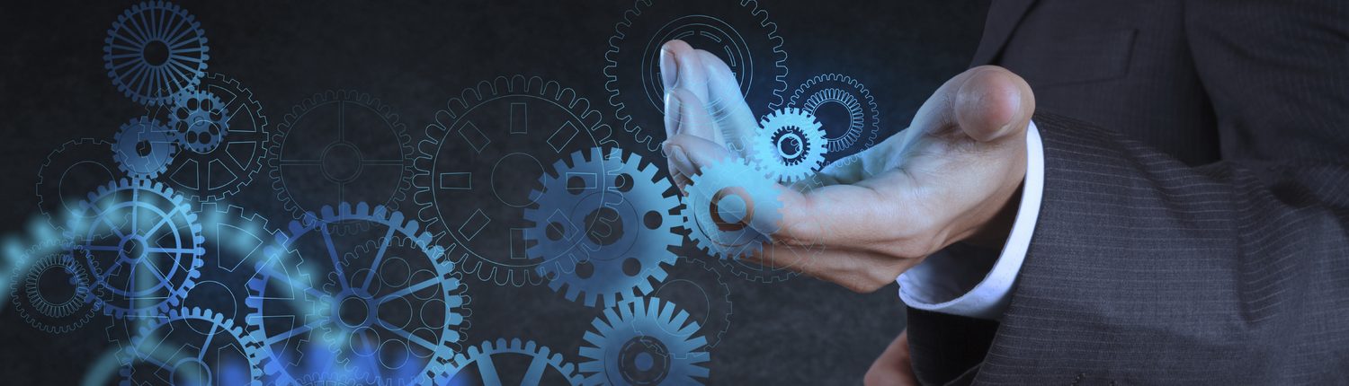 businessman hand touch blue gear to success as concept